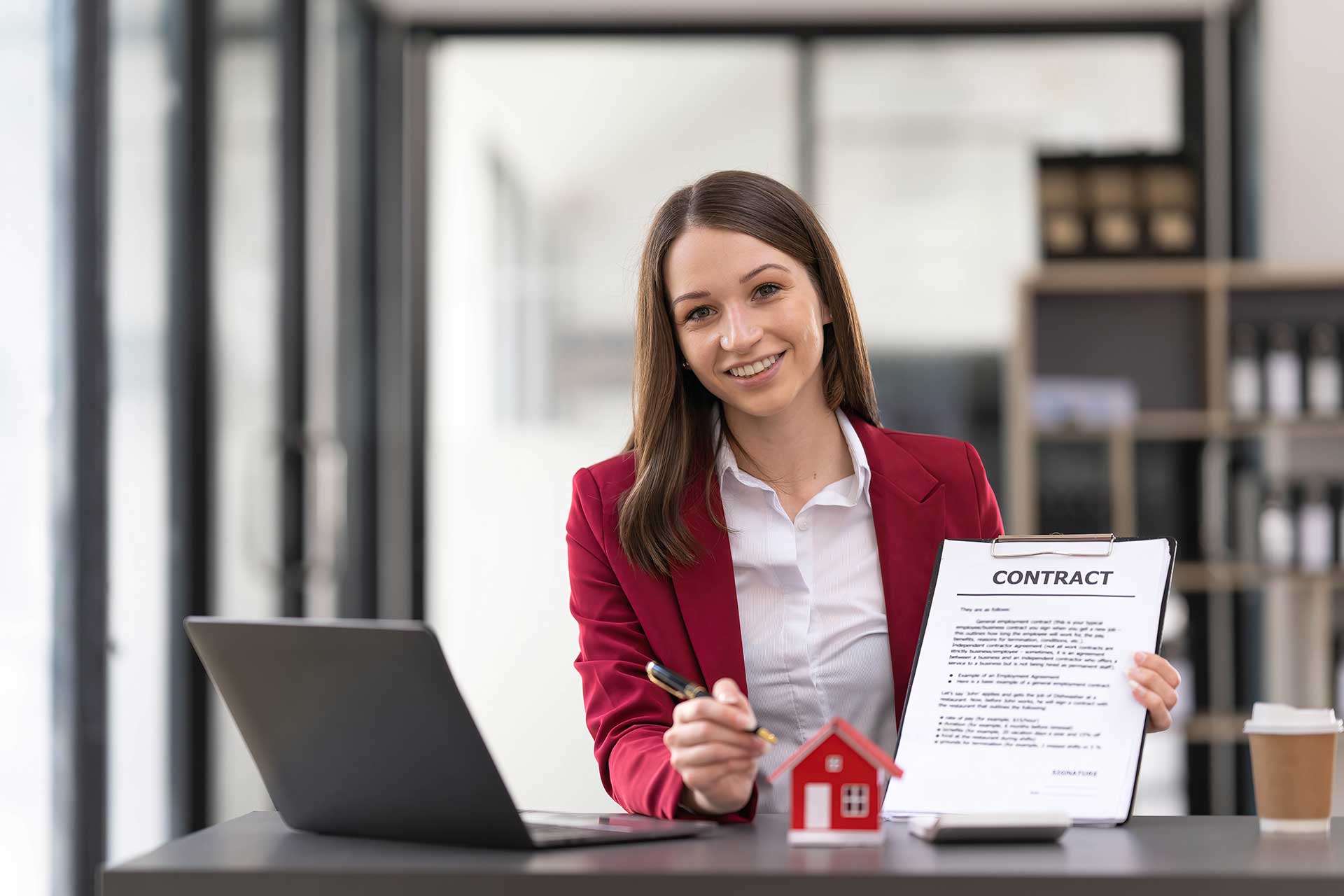 portrait-of-a-real-estate-agent-or-buyers-are-offe-YL42PZJ.jpg
